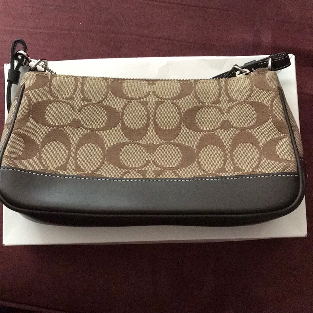 Brand New small coach purse.